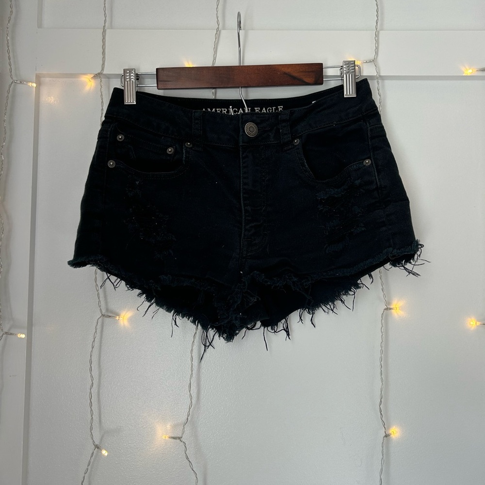 Black American Eagle shorts both sides have holes